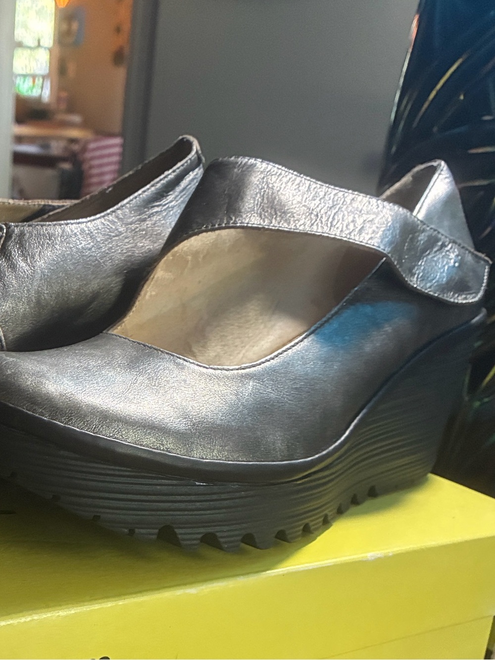 Fly London metallic silver leather wedge